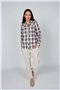 Blusa con ojetes